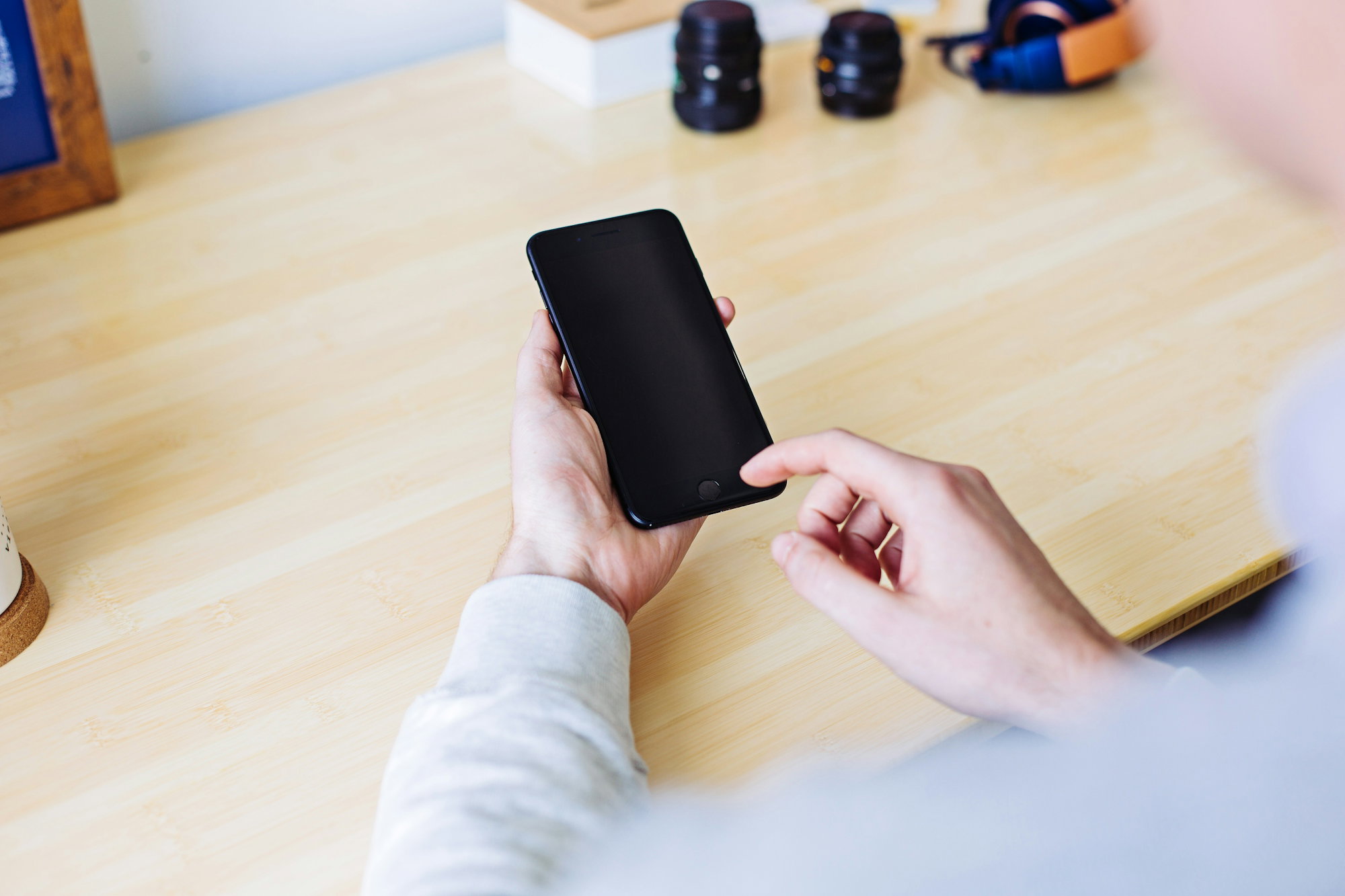 person-holding-smartphone.jpg person holding smartphone